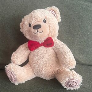 Adorable Tan Plush Bear with Red Bow